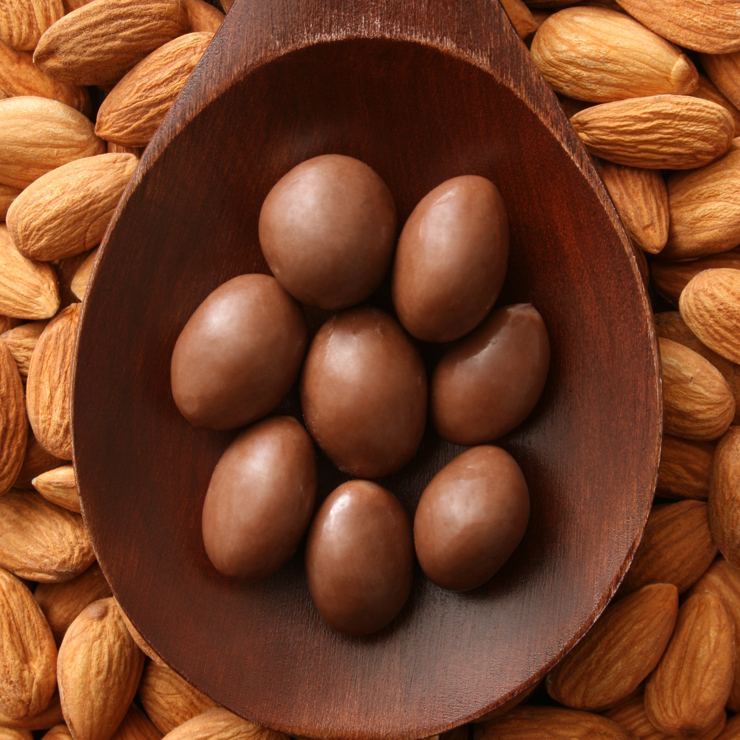 Amêndoa coberta de chocolate - 100g Paladeria